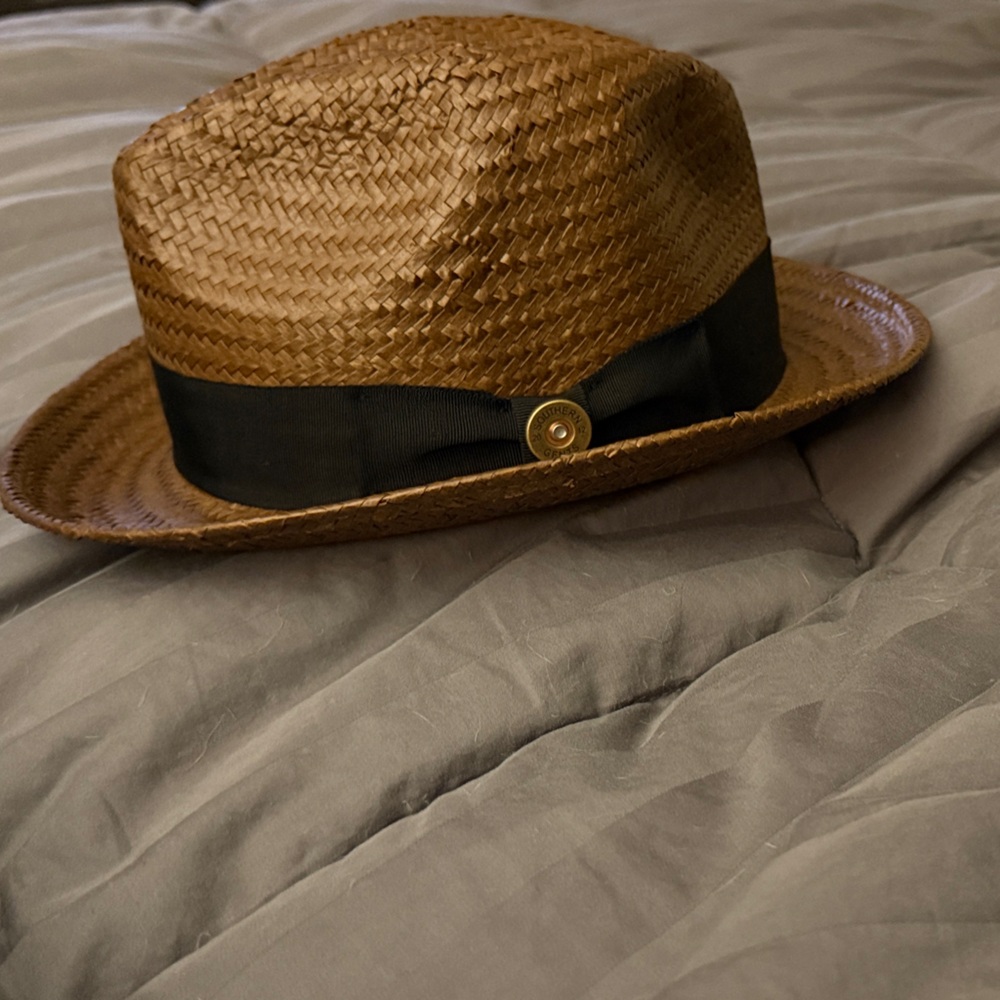 Stylish Brown Straw Hat with Black Band